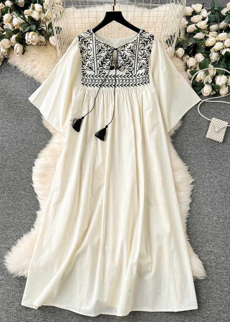 Elegant White Cotton frock with Black Embroidery